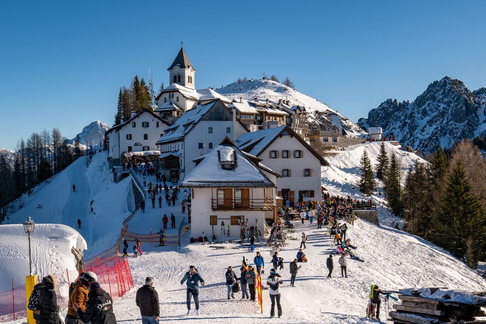 A bustling winter ski resort in Friuli Venezia Giulia, Italy. Perfect for skiing and alpine adventures.