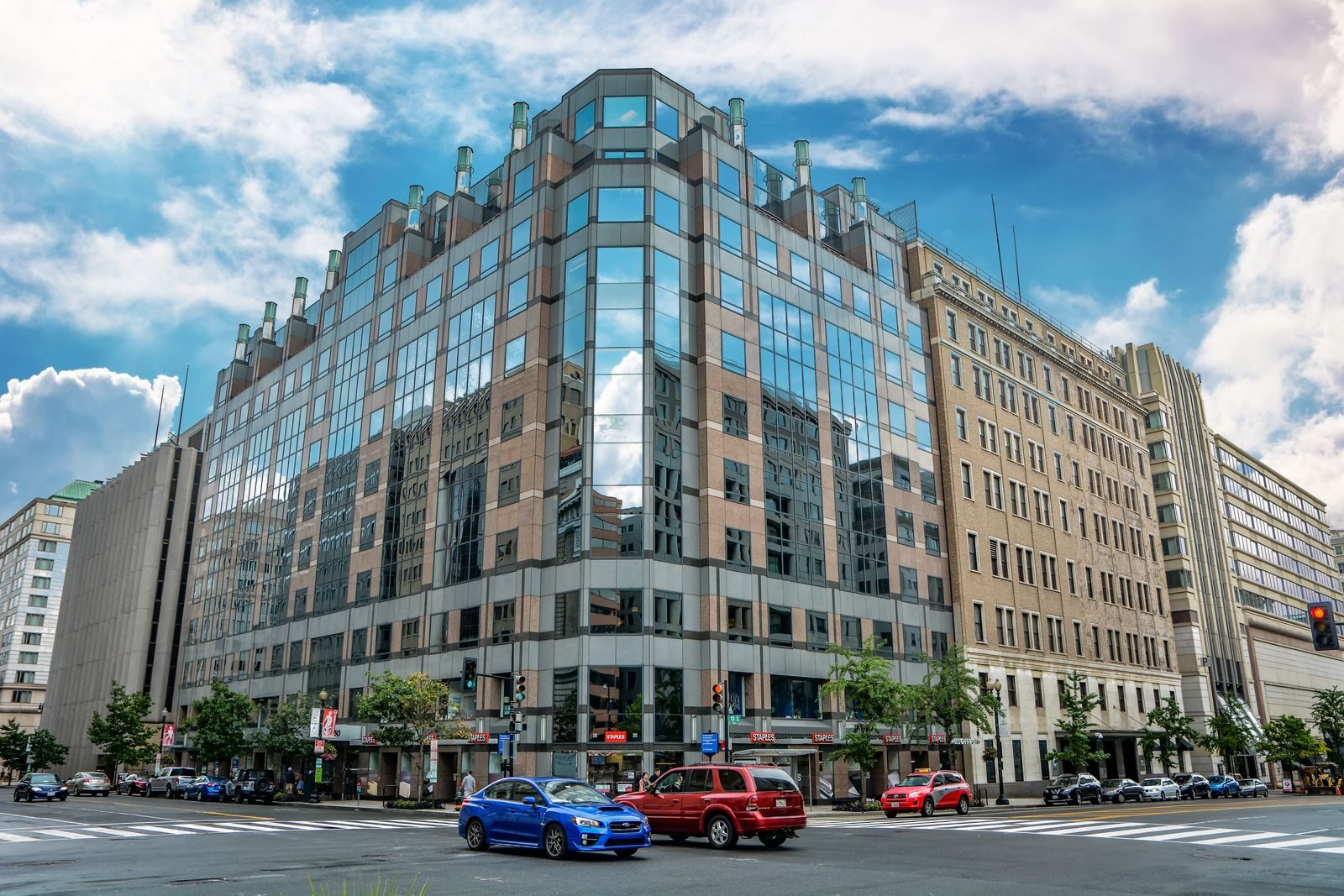 "Modern luxury apartment building at Avec on H Street in Washington, DC, featuring contemporary architecture, upscale residences, stylish balconies, landscaped entrance, and an urban lifestyle in the heart of the city."