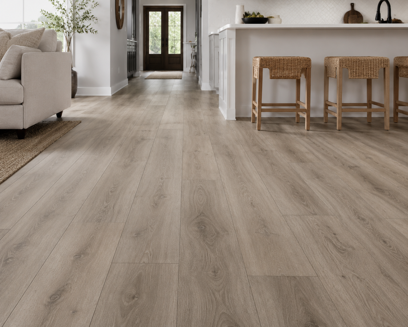 Luxury vinyl plank (LVP) flooring with realistic wood grain installed in a bright, modern open-concept kitchen and living room.