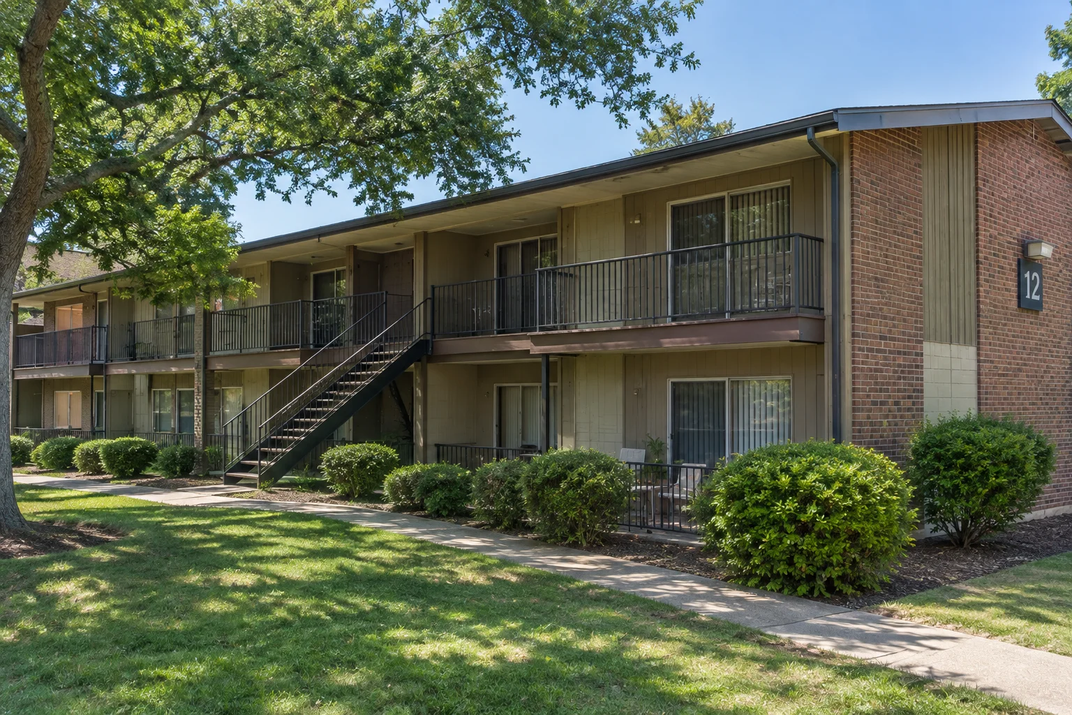 Two-story garden-style apartment building exterior in San Angelo Texas