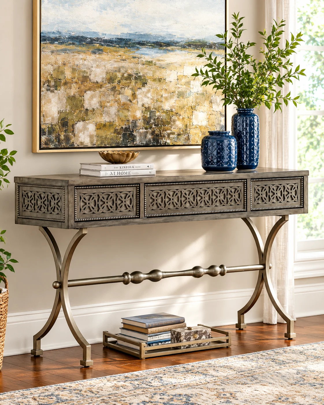 Ashley Quinnland Console Sofa Table in a stylish living room with decorative vases and books