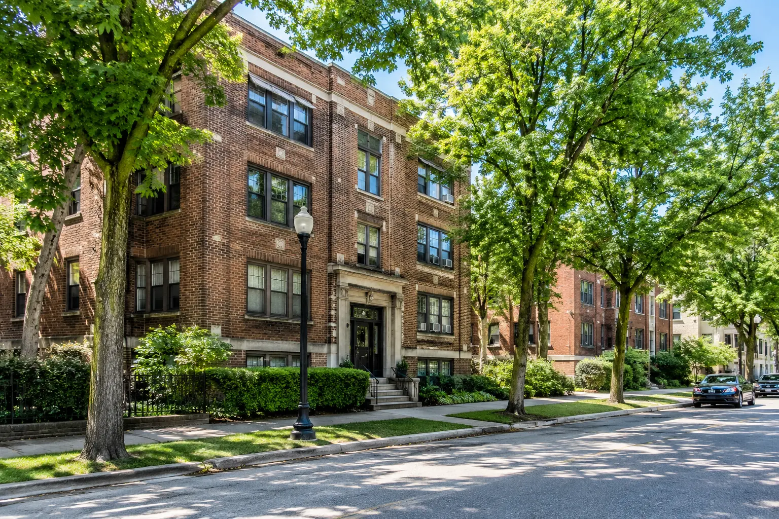 Brick apartment building on a tree-lined street in Saint Paul, Minnesota